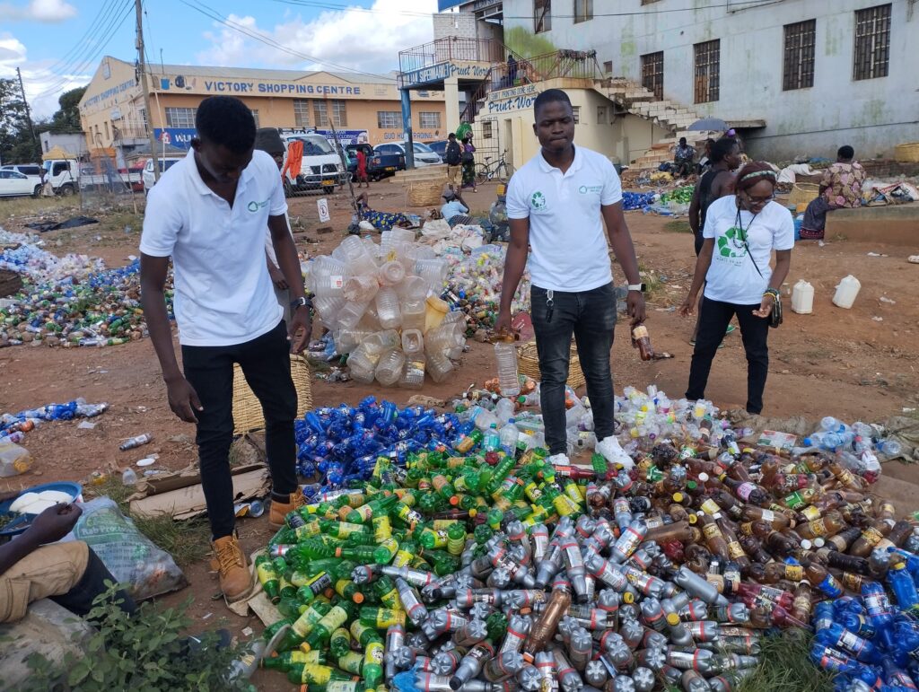 Clean cities project youths collecting plastic waste in the middle of the town of he Lilongwe city